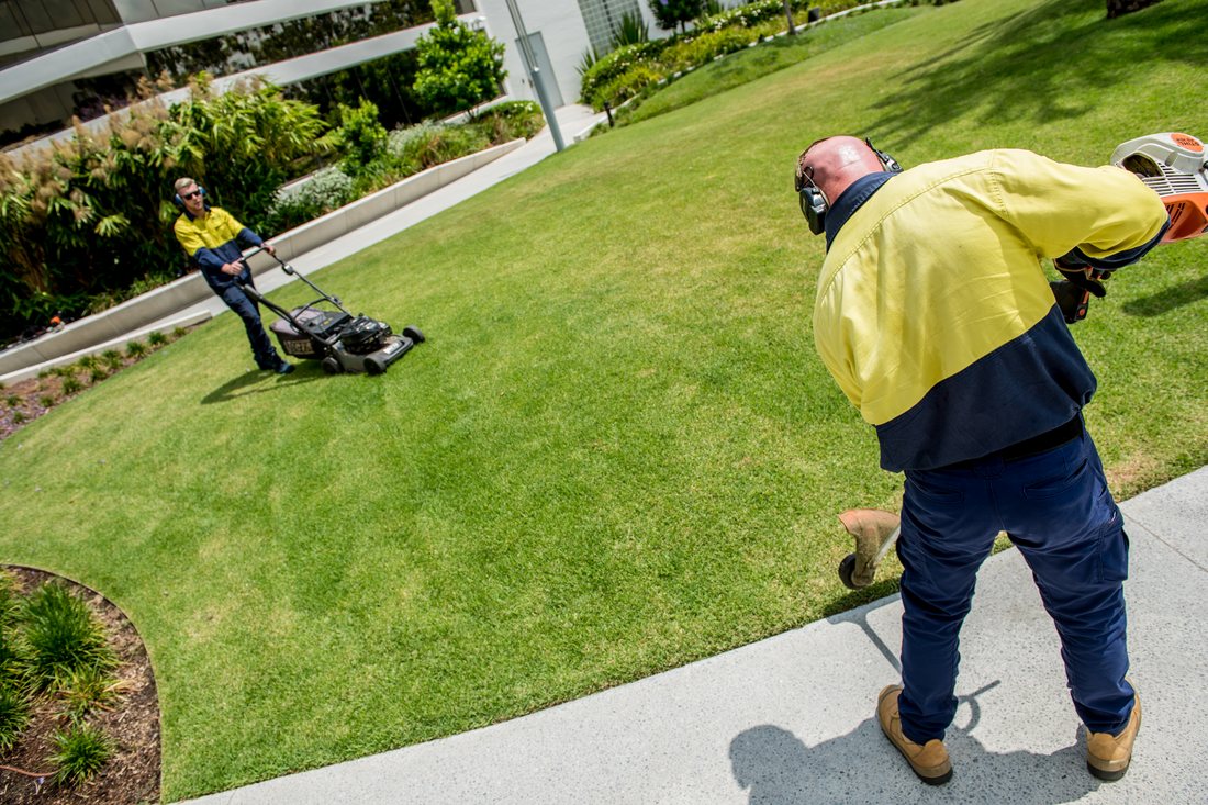 Garden Square — Grolife crew mowing seen from above
